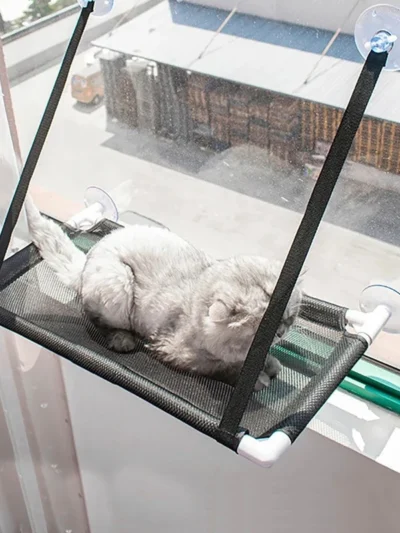 Kitty Breezy Basket Hammock. “For kitties who love a light sway and a cozy getaway.”